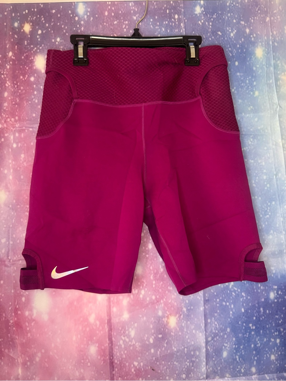 Nike City Ready women's 7-inch running shorts in the color Berry